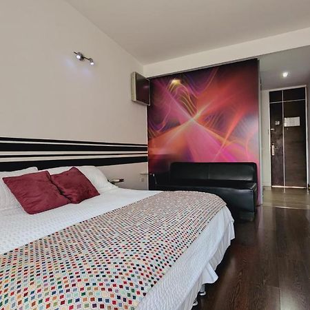 Hotel Austral Suites Кали Екстериор снимка